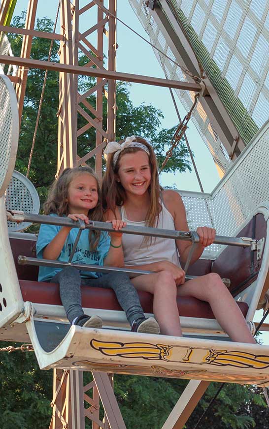 Birthday guests enjoying Dutch Village rides
